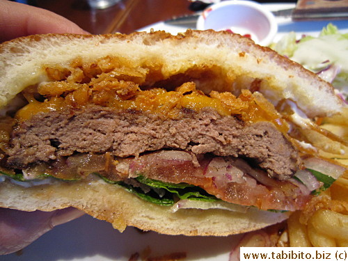 Overcooked patty but still juicy and aromatic with chargrilled flavor