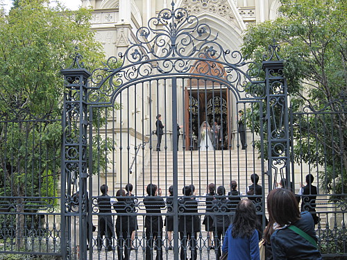 The impeccably-dressed staff have been waiting for the newlywed to 