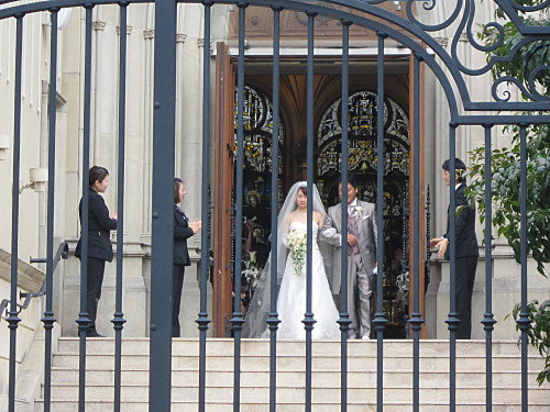 emerge from the church