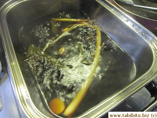 After the stock is done, add soy sauces and sugar