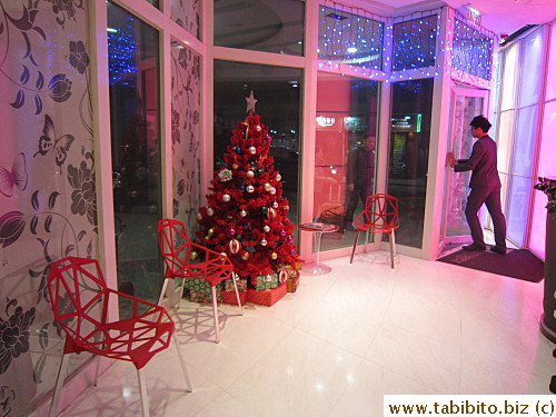 Very small reception area, non-existent lobby
