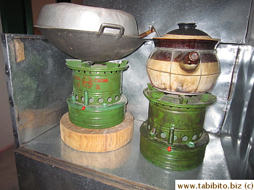 Mom cooked on kerosene stoves just like these on the hallway outside the apartment