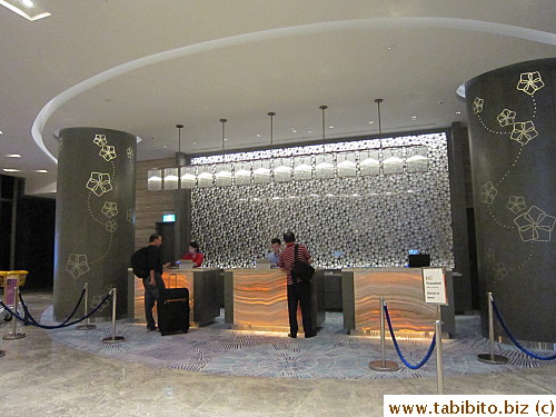 Reception desk (Staff wear a US style police badge as ID)