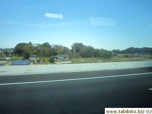 Seeing farmland means we're in Narita