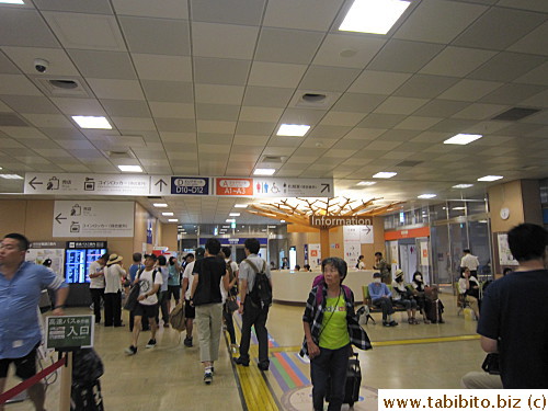 Terminal is located outside past the information desk