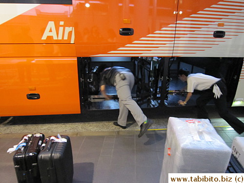 Even the bus driver helped stow bags into the storage at one time