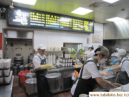 At the counter, a lady fills your drinks order first, then another lady takes your food order and collects money while the line is hurried along by the staff. Everything is done at breakneck speed, it's a little panicky for me
