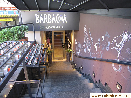 Stairs lead to the basement restaurant